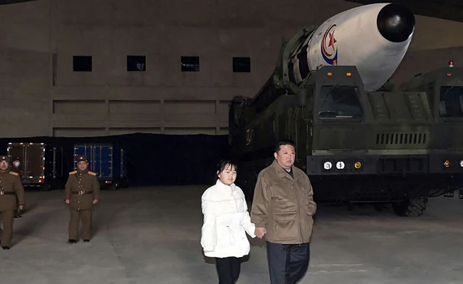 Kim Jong Un with daughter 